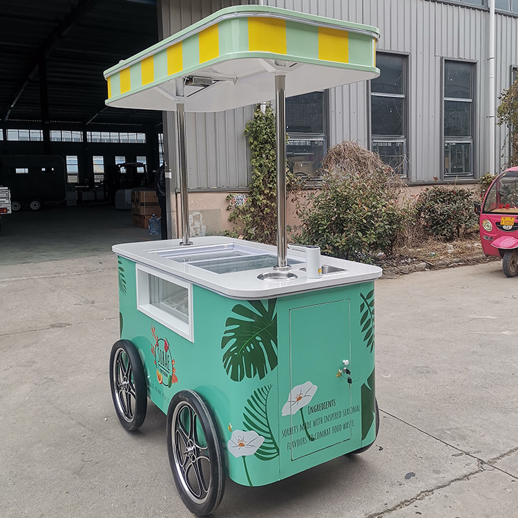 Comerciante Mini Exhibición de helados congelados Carrito de remolque de helados de playa mexicana helados congelador Carrito de mano Carritos de empuje para helados